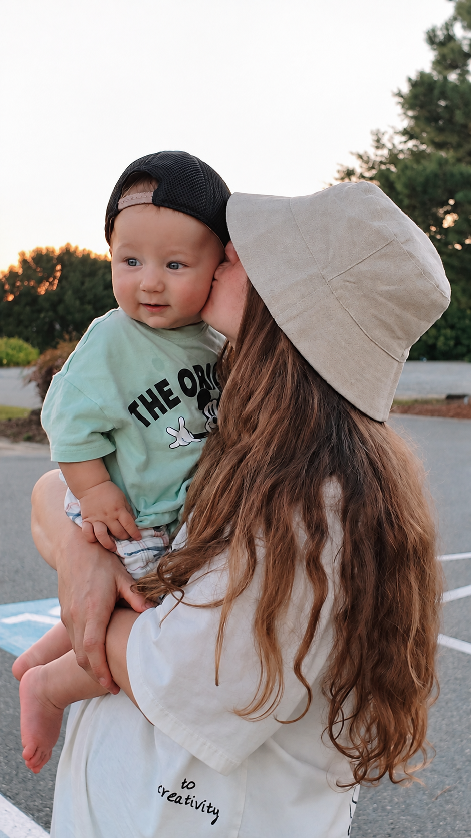 Marina kissing Eugene during an evening walk